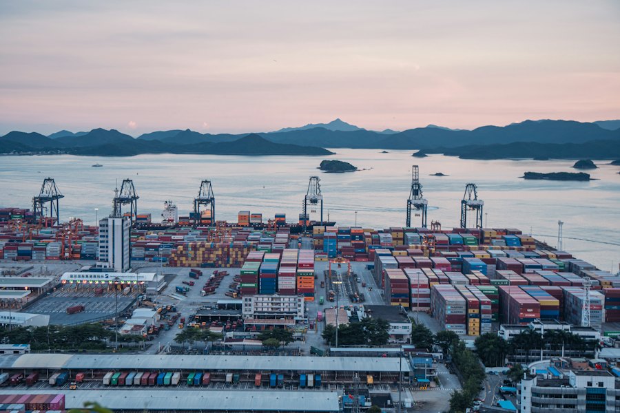 Illustrative export containers and harbor scenery