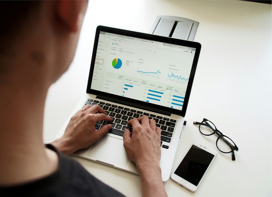 Illustrative professionals working together with a laptop