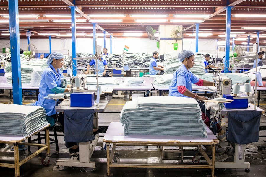 Illustrative textile garment production workers