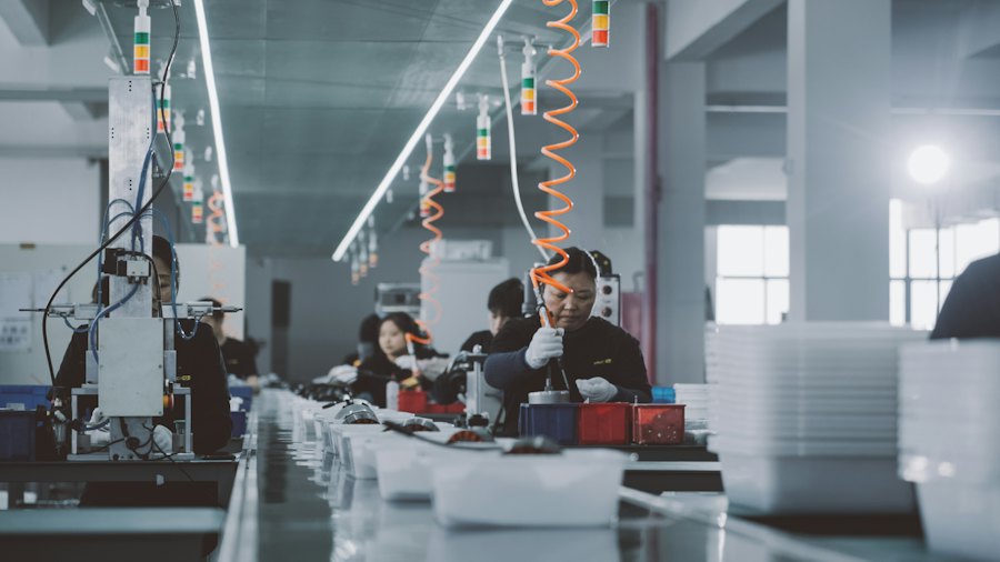 Illustrative industrial production team at a factory